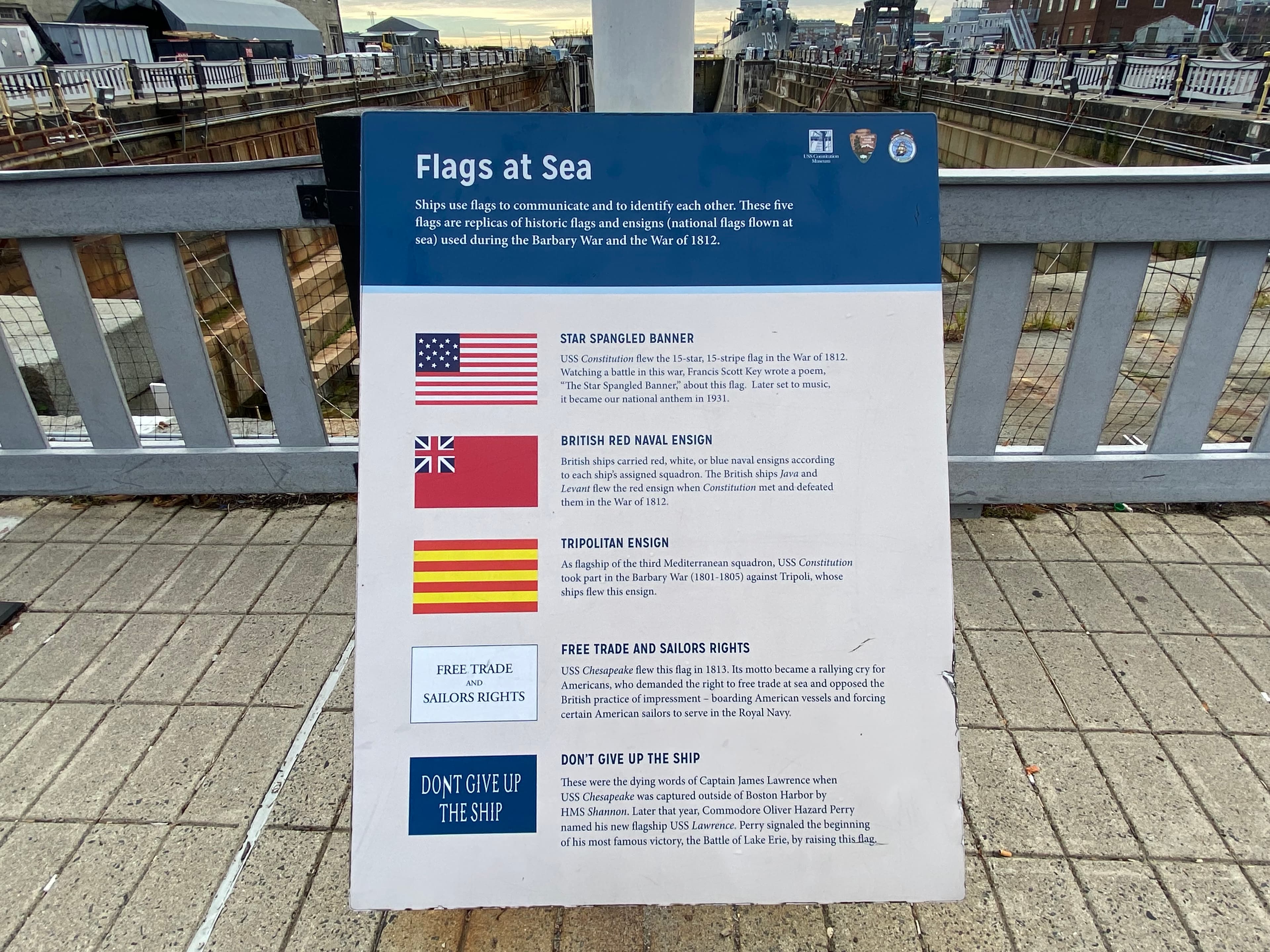 "Flags at Sea" Sign