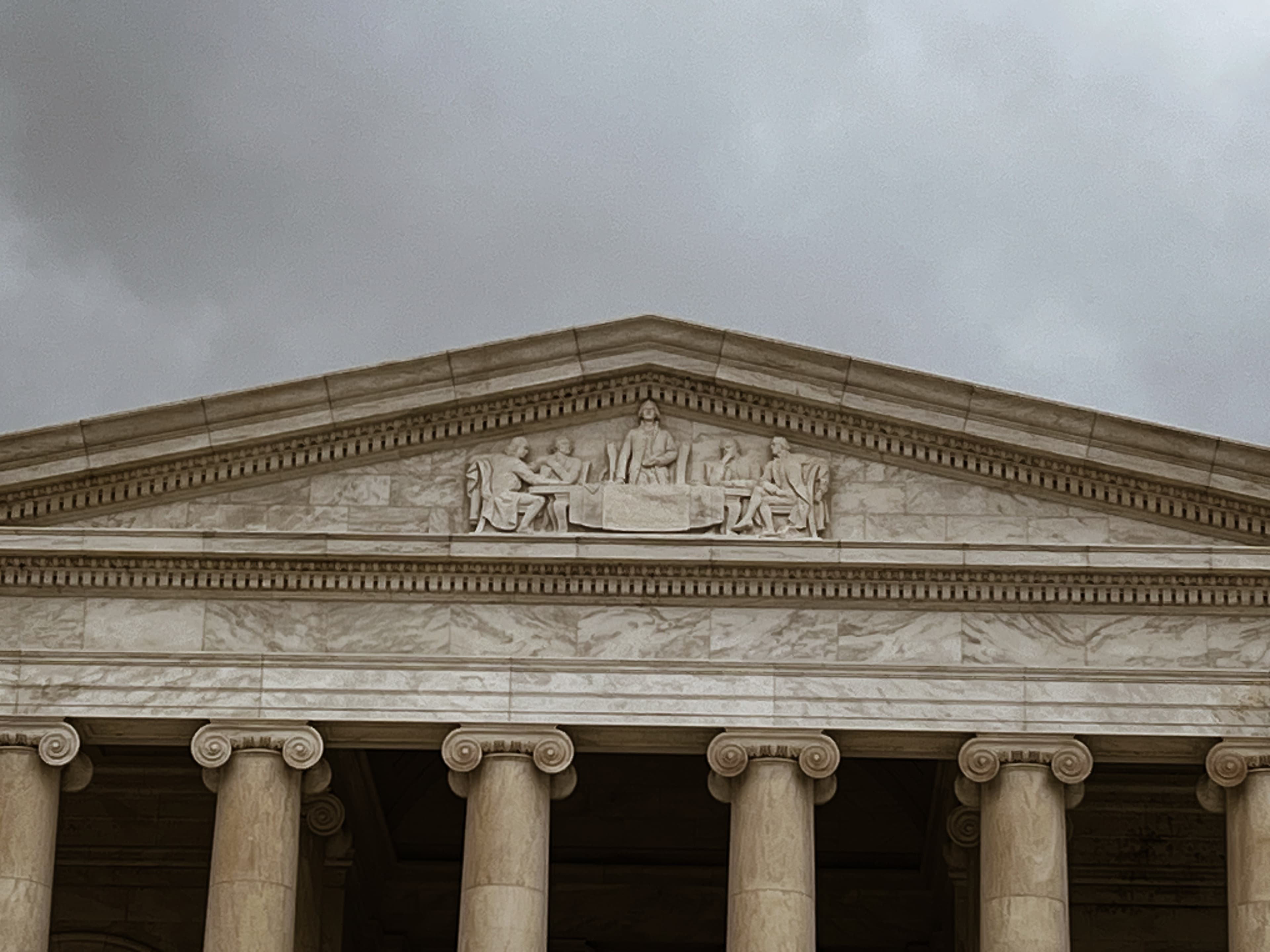 The Tympanum (triangular area above the entrance of the memorial)